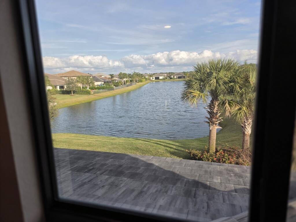 527 Southeast Vallarta Dr Port Port St. Lucie, FL 34984 - Photo 58 of 59 61-Upstairs View at Fifth Bedroom