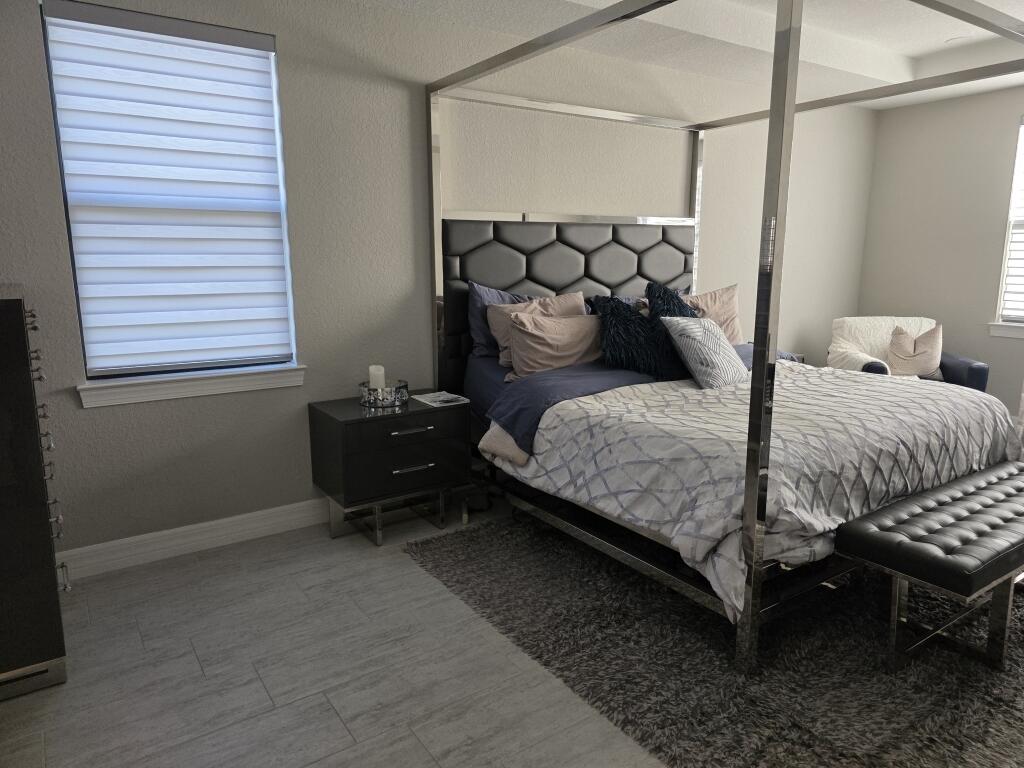 527 Southeast Vallarta Dr Port Port St. Lucie, FL 34984 - Photo 10 of 59 10-Master Bedroom 2