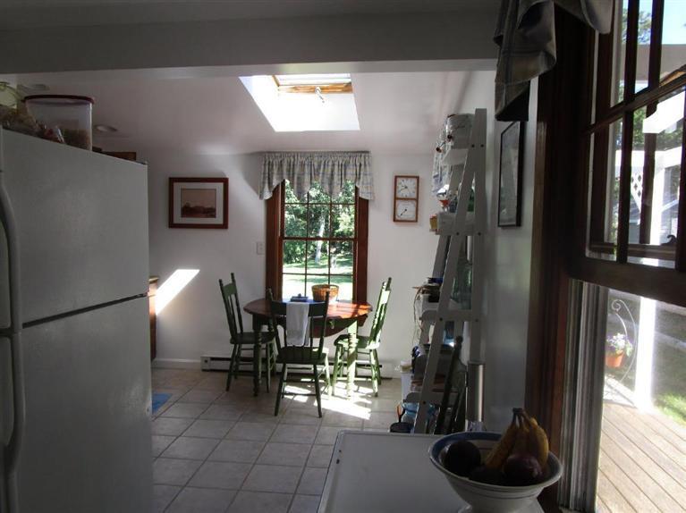 104 Cannon Hill Road Wellfleet, MA 02667 - Photo 14 of 30 a dining room with furniture and a window