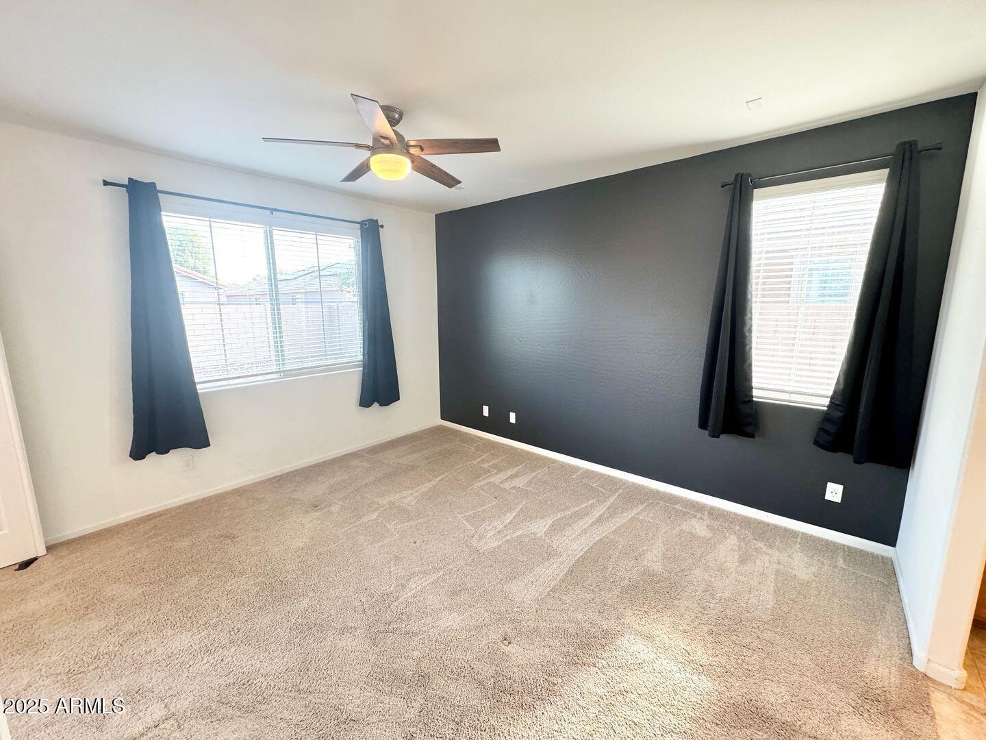 3870 East Balsam Drive Chandler, AZ 85286 - Photo 16 of 39 a view of an empty room with a window