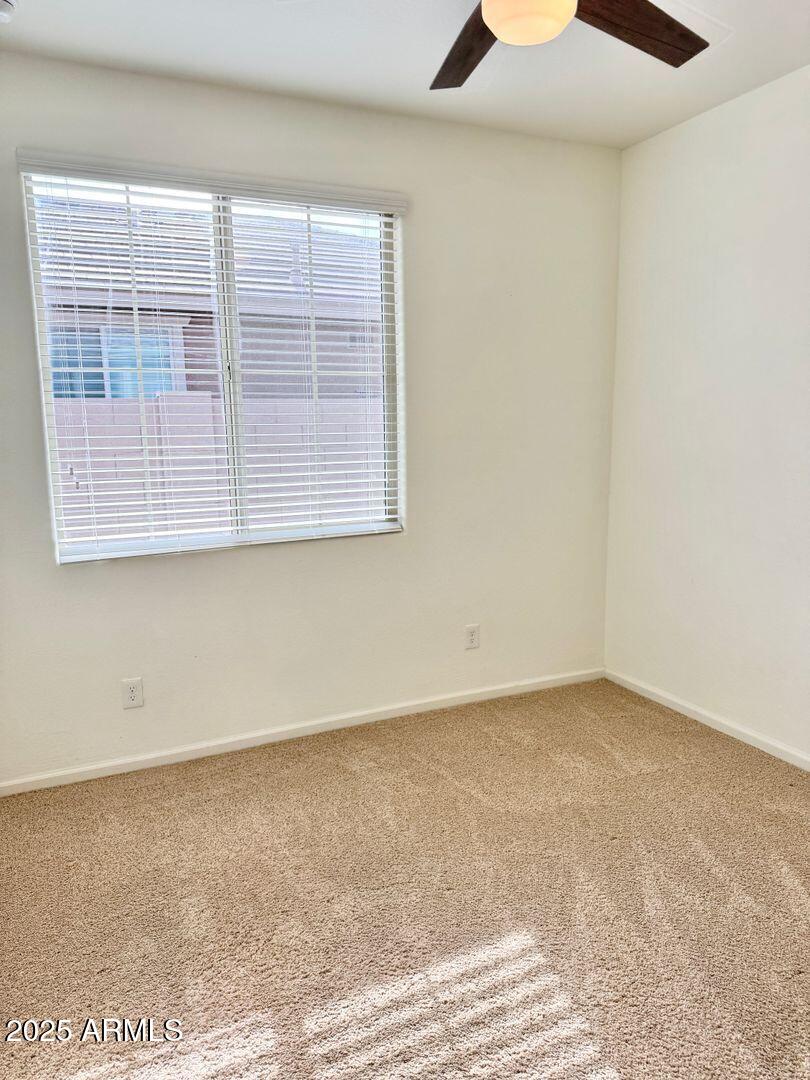 3870 East Balsam Drive Chandler, AZ 85286 - Photo 30 of 39 an empty room with a window