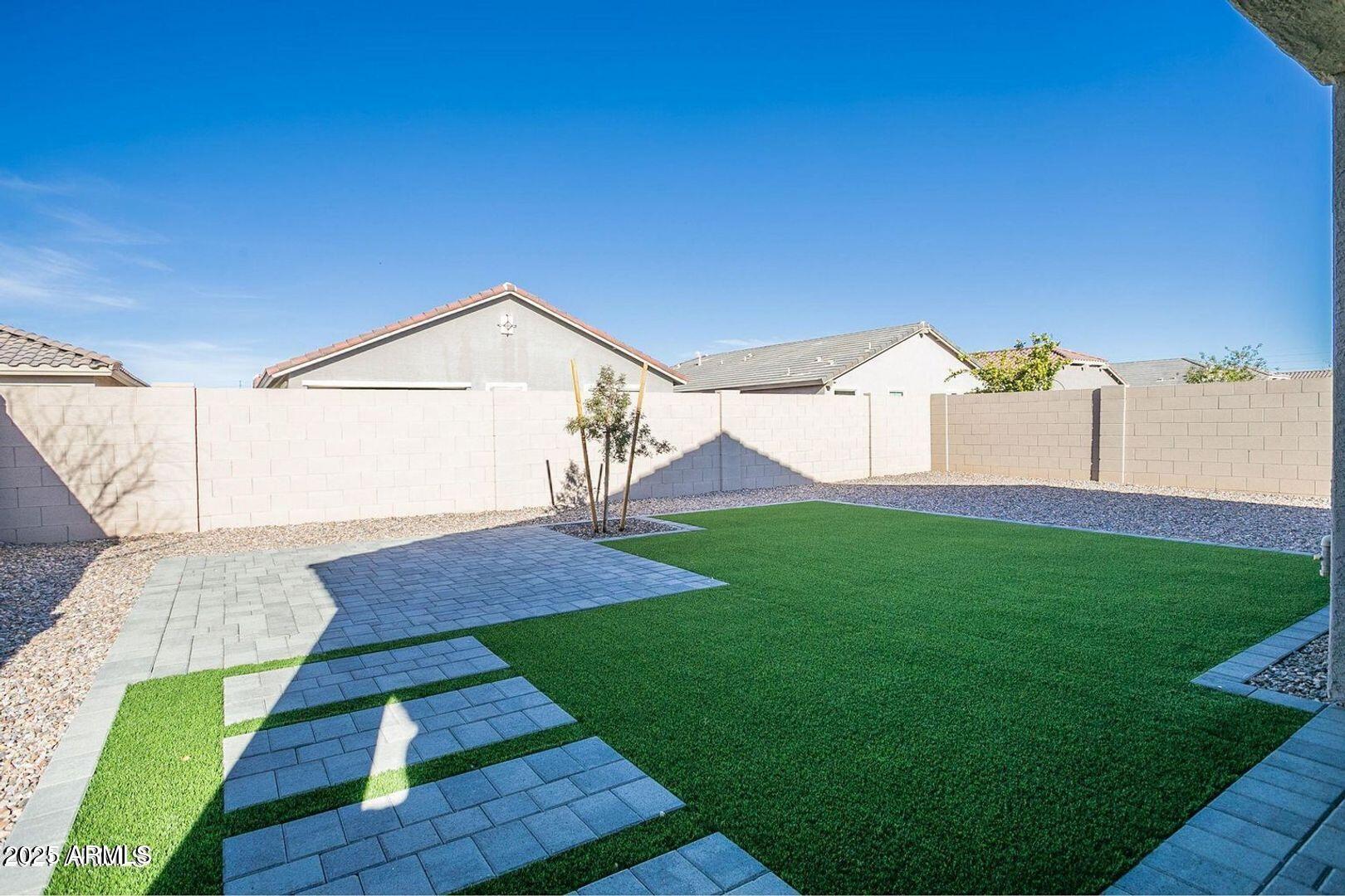 3870 East Balsam Drive Chandler, AZ 85286 - Photo 36 of 39 a view of a yard in front of a house