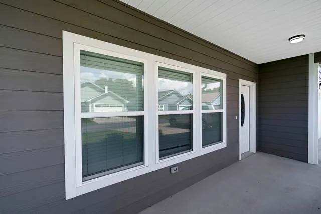 a view of a glass door of the house