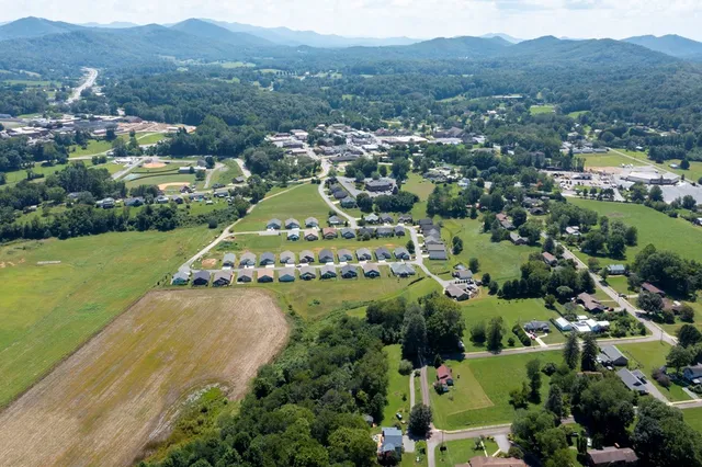 a view of a city with mountains