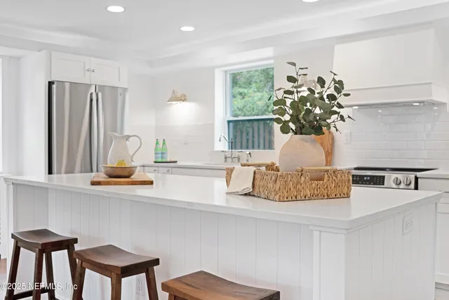 a vase of flowers sitting on a table