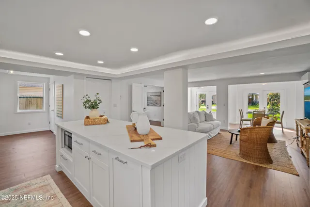 a view of a living room and dining room