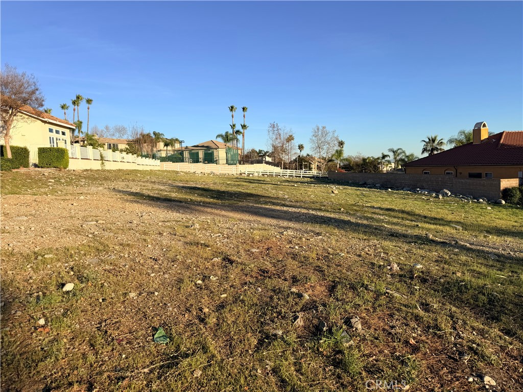 5034 Bramble Court Rancho Cucamonga, CA 91737 - Photo 2 of 6 a view of a town with an ocean and a building in the background