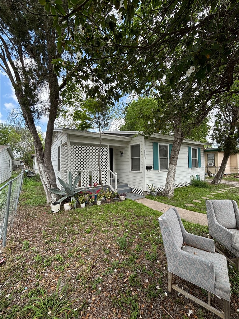 4933 Concord Street Corpus Christi, TX 78415 - Photo 2 of 6 front view of a house with a yard