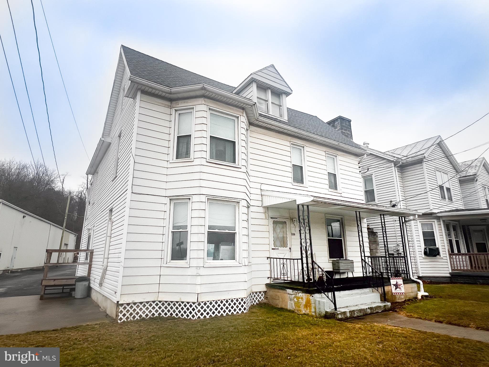 336 South Main Street Burnham, PA 17009 - Photo 2 of 36 a front view of a house with a yard