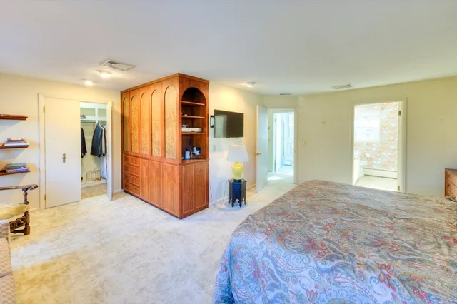 a view of a livingroom with a furniture