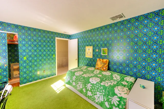 a view of a back yard from a balcony