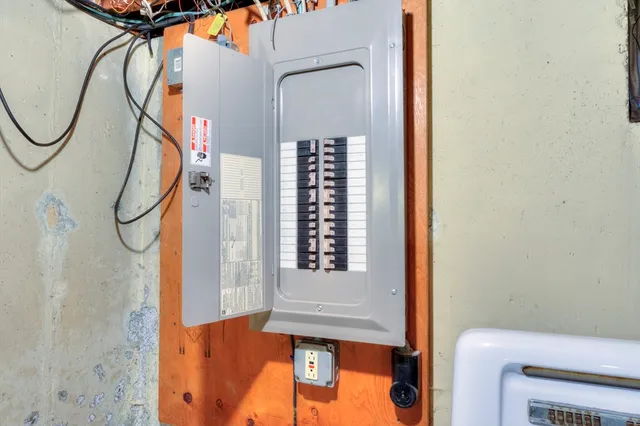 a view of a staircase with white walls