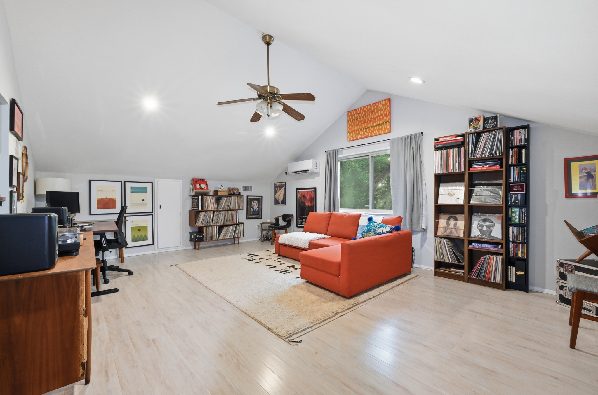 2509 Redleaf Lane Austin, TX 78745 - Photo 17 of 28 Spacious bonus room featuring a vaulted ceiling with a ceiling fan, recessed lighting, and wood-finish flooring