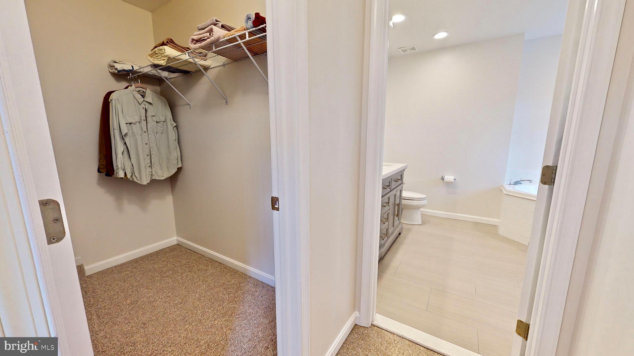 12210 Potomac View Road Newburg, MD 20664 - Photo 28 of 63 Upper level - Master bedroom walk-in closet #1