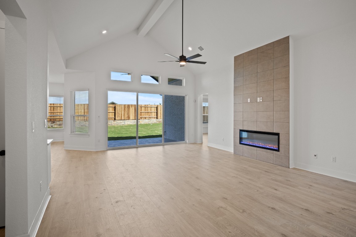 245 Begonia Street Buda, TX 78610 - Photo 5 of 21 a view of an empty room with a window