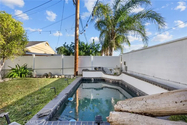 a view of a house with a swimming pool