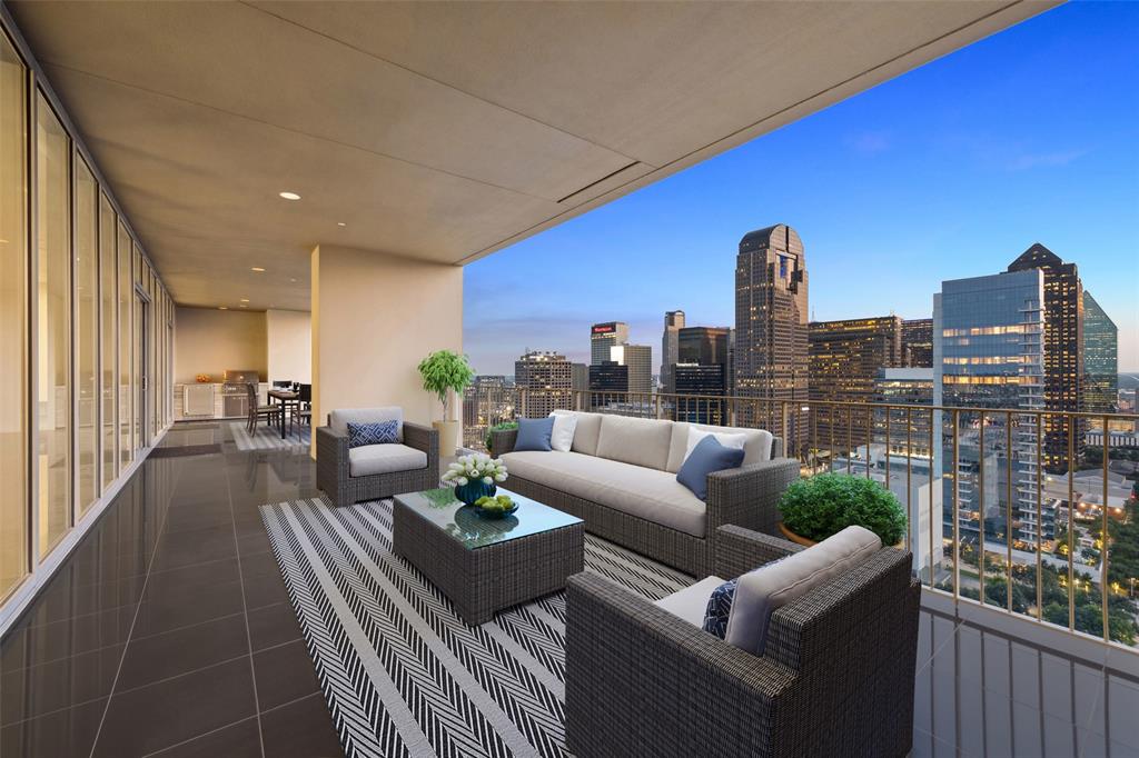 a living room with furniture a city view