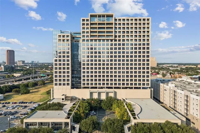 a view of a city with tall buildings