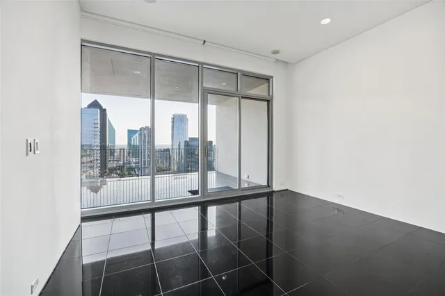 a bathroom with a double vanity sink and mirror