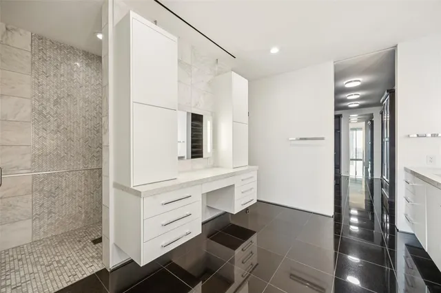 a kitchen with appliances and cabinets