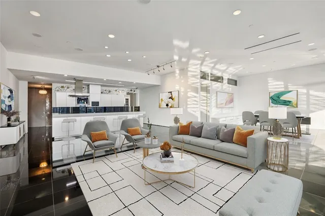 a living room with furniture and a table