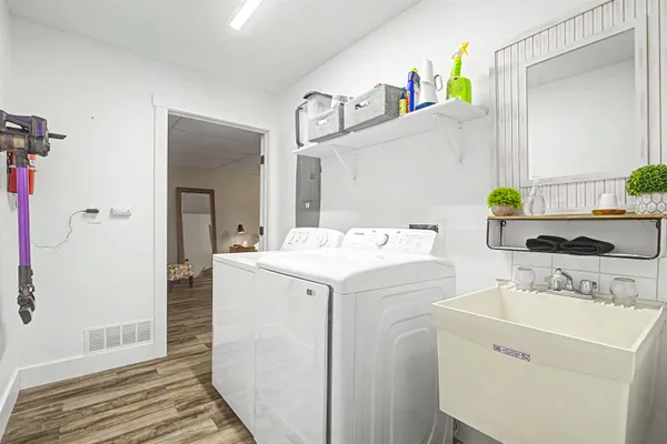 a utility room with dryer and washer