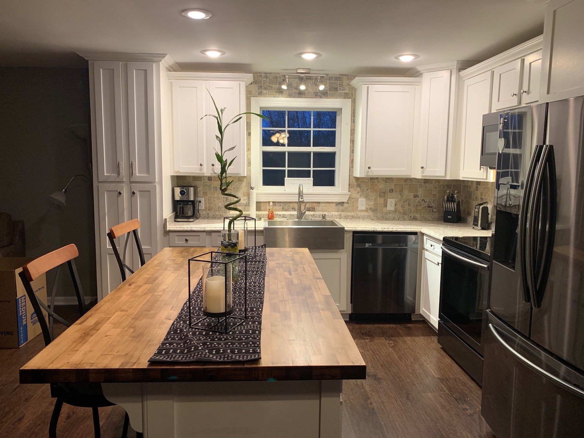 3255 Old Rome Pike Lebanon, TN 37087 - Photo 6 of 23 a kitchen with kitchen island a counter top space a sink stainless steel appliances and cabinets
