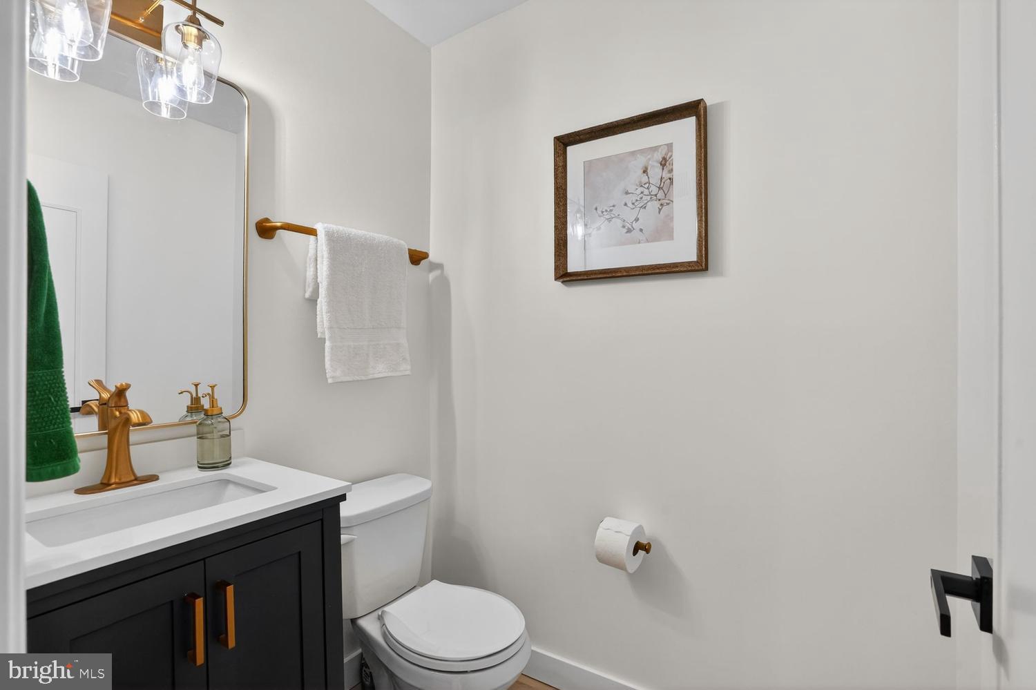 8532 Lakinhurst Lane Springfield, VA 22152 - Photo 23 of 62 Powder room w/ new vanity, mirror & fixtures