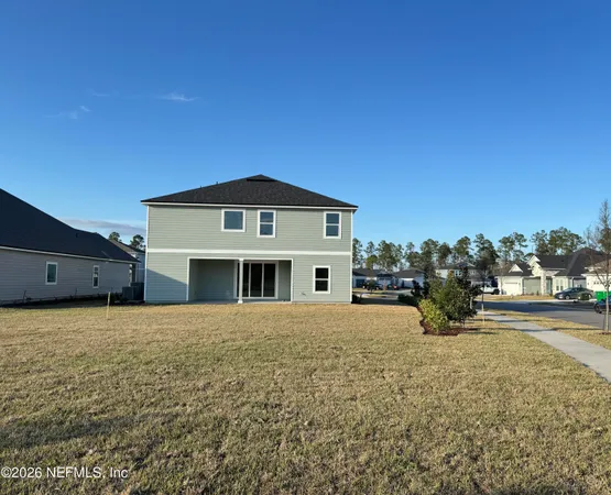 a view of a house with a big yard