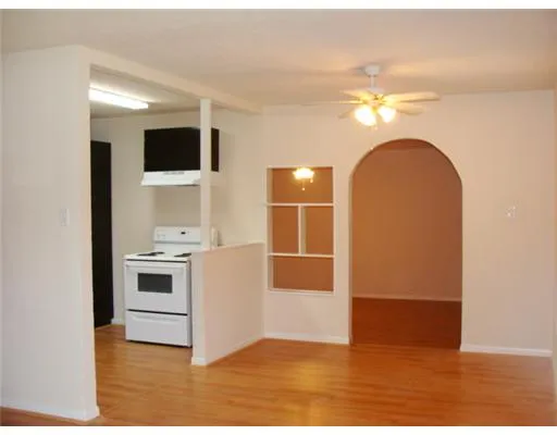 a view of kitchen with wooden floor