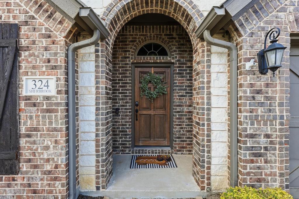 324 Sherbrook Street Van Alstyne, TX 75495 - Photo 2 of 27 a view of front door of a building