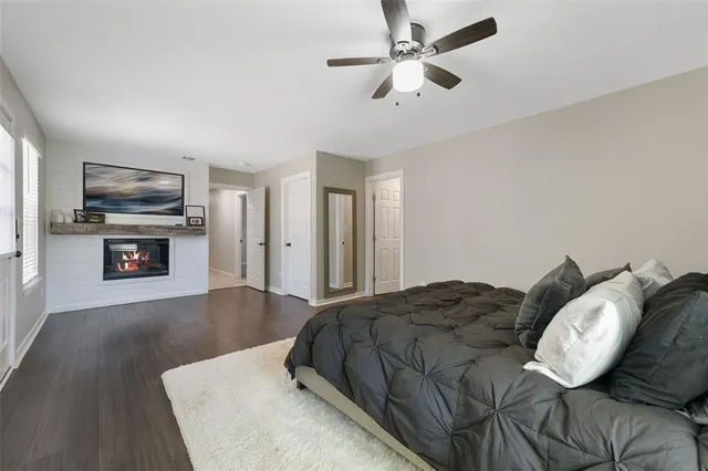 a bathroom with a sink a mirror and vanity