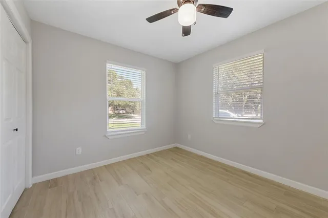 a spacious bathroom with a double vanity sink mirror and