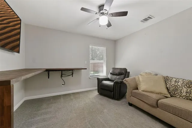 a bathroom with bathtub and shower