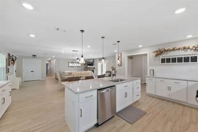 a view of backyard with a garden and trees