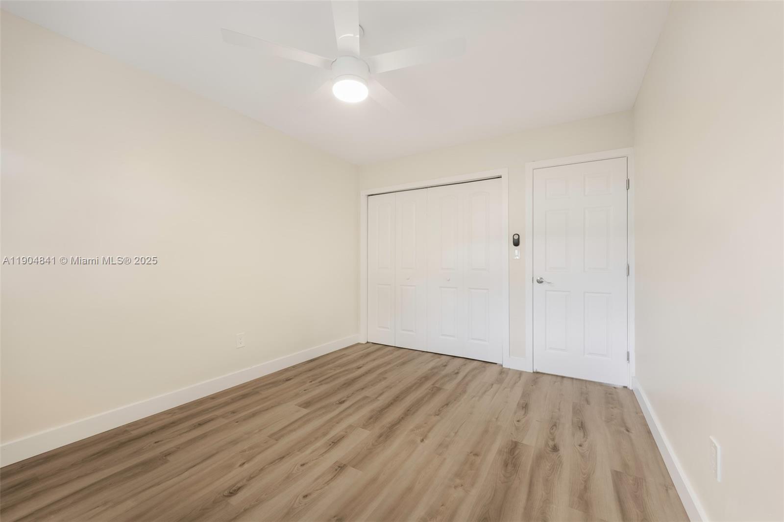 3101 Southwest 19th Street, Unit 3101 Miami, FL 33145 - Photo 8 of 15 a view of small space with wooden floor