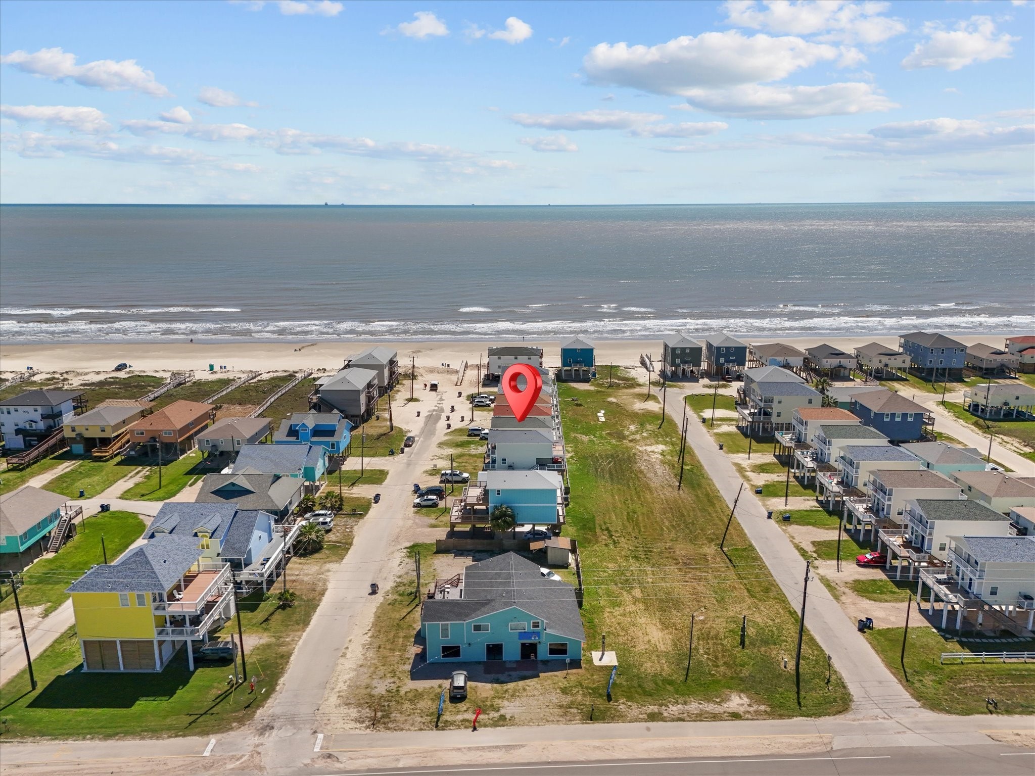 127 Howard Avenue Surfside Beach, TX 77541 - Photo 4 of 29 an aerial view of residential houses with outdoor space