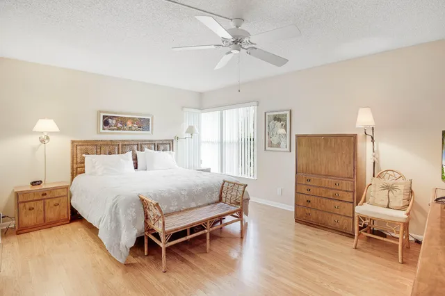a bathroom with a shower and toilet