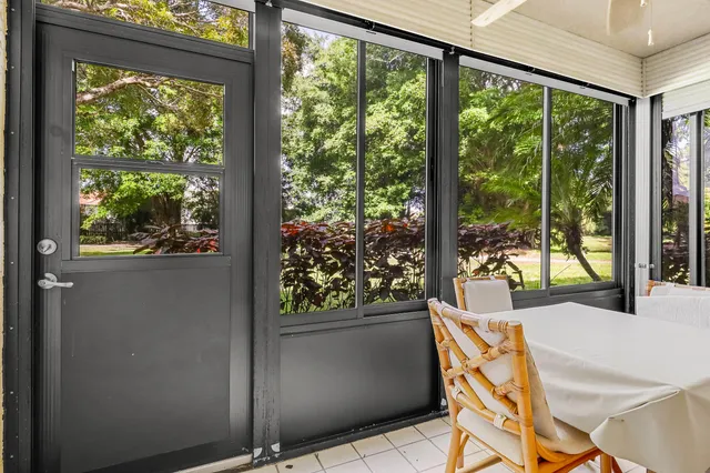 an aerial view of a house with a lake view