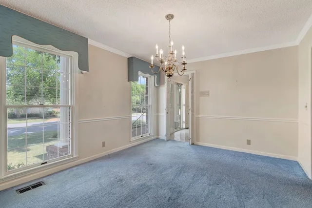 a view of a hallway with a shower