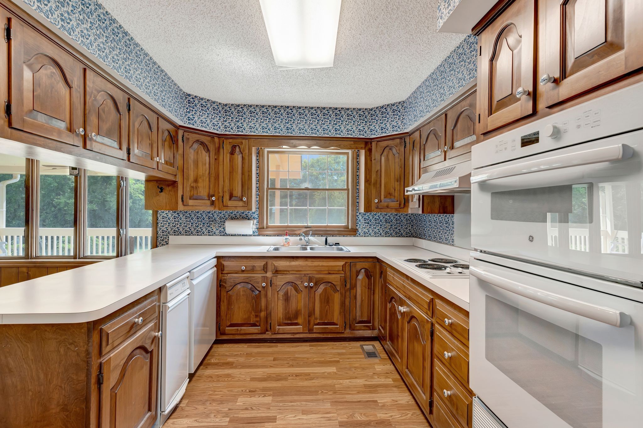 203 Rising Sun Terrace Old Hickory, TN 37138 - Photo 14 of 77 a large kitchen with stainless steel appliances granite countertop a large stove top oven and cabinets