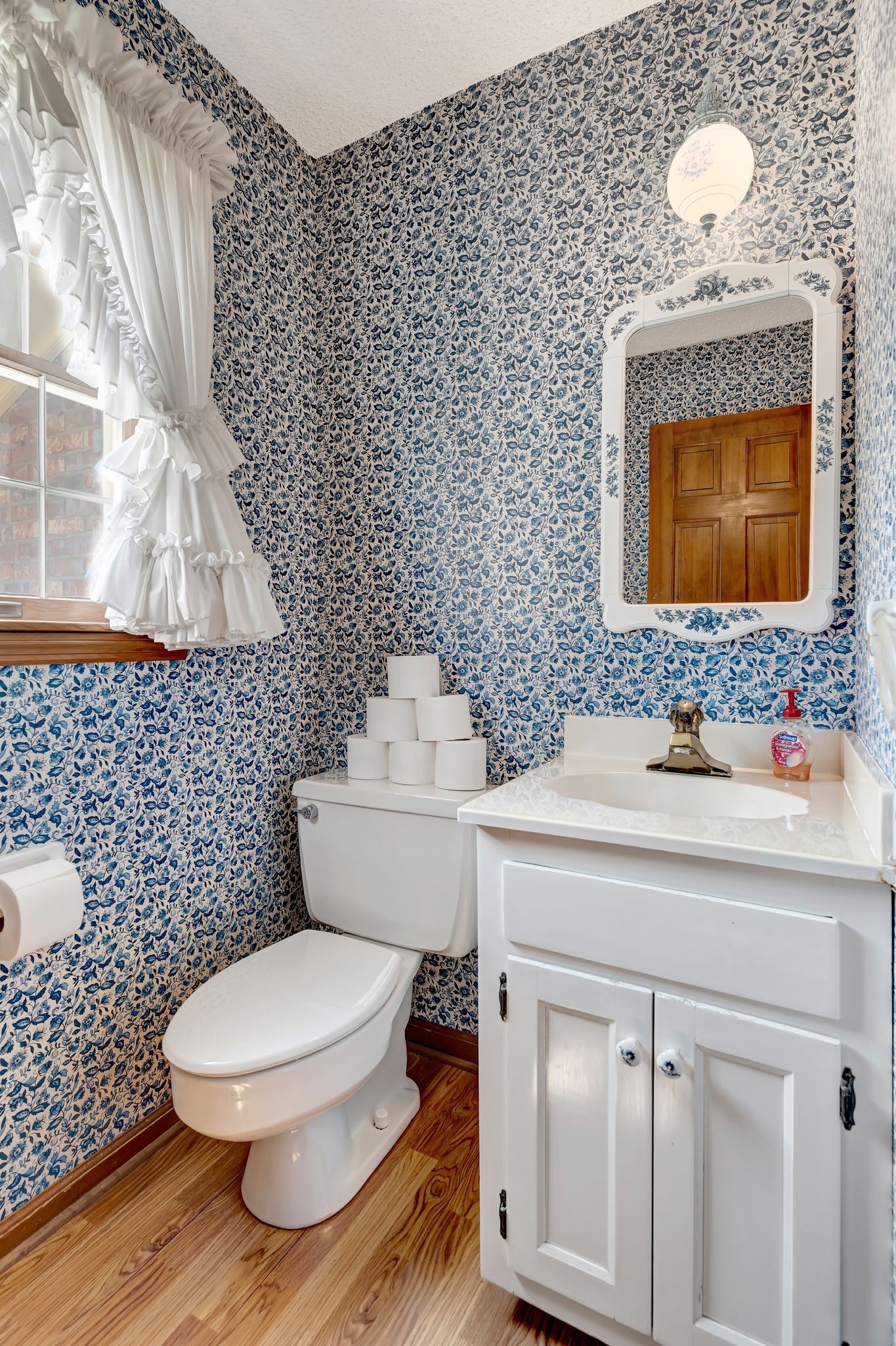 203 Rising Sun Terrace Old Hickory, TN 37138 - Photo 16 of 77 a bathroom with a toilet a sink and mirror