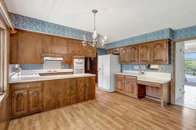 a view of a balcony with wooden floor