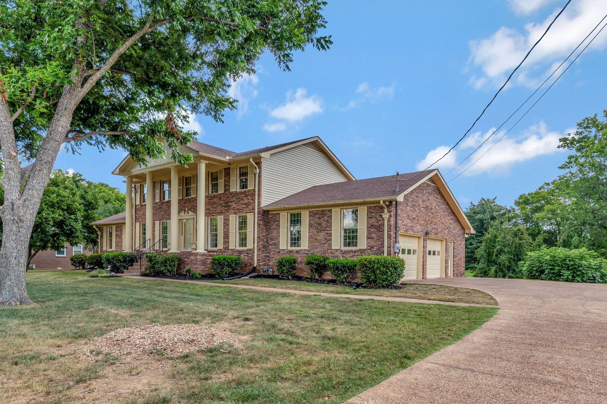 203 Rising Sun Terrace Old Hickory, TN 37138 - Photo 60 of 77 a front view of a house with a garden