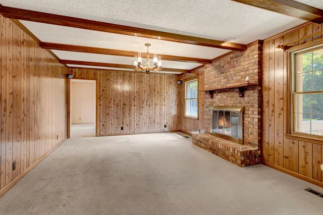 a view of an empty room and window