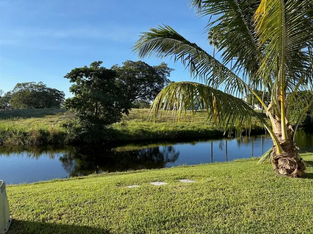 a view of swimming pool with a garden