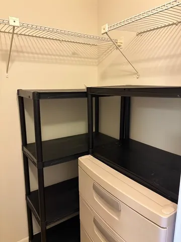 a view of small space with racks on the wall