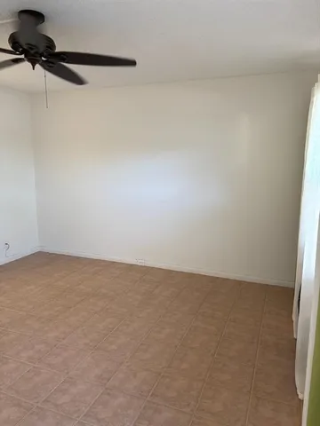 a view of a room that has a window in it