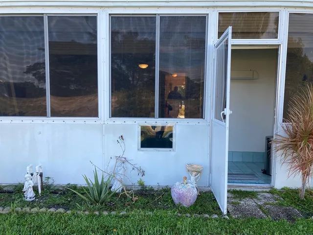 a view of a swimming pool with an outdoor space