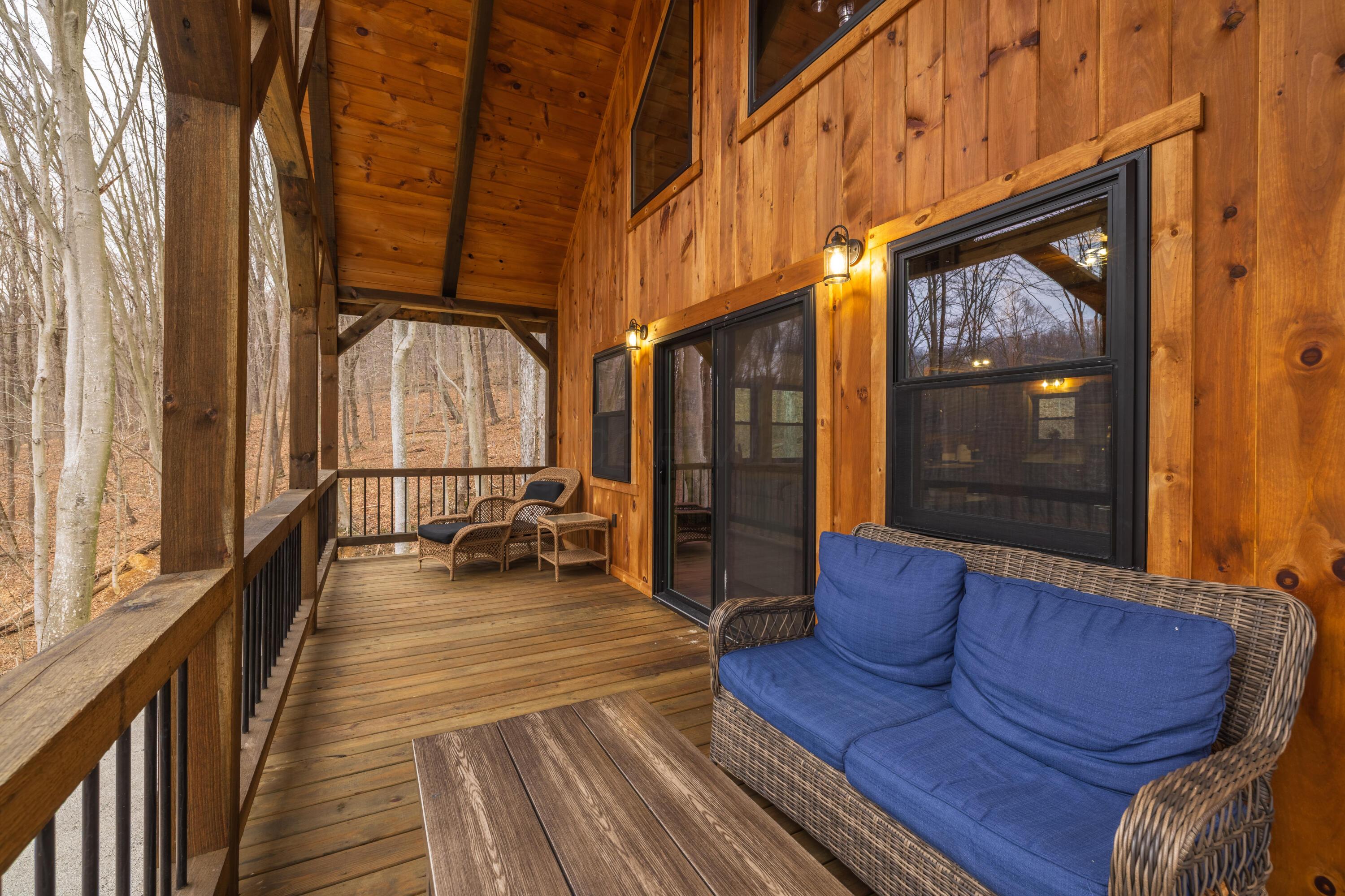 344 Skaggs Road Londonderry, OH 45647 - Photo 23 of 57 Sage Hill Escape outside living on the front covered balcony